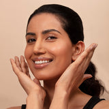 Female model in her 30s with clear, smooth complexion - showing the results ARK's Conditioning Cleanser can have