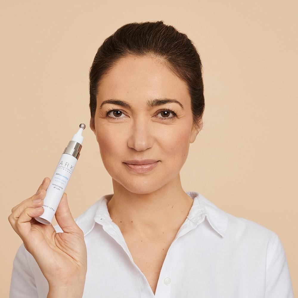 Model & ARK customer Tatiana uses the Eye Cream's cooling massage ball to minimise dark circles & crows feet