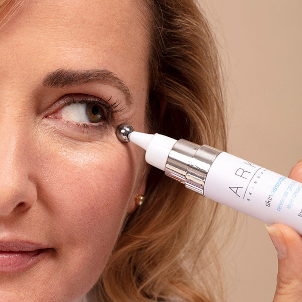 Model uses the Eye Cream's cooling massage ball to minimise dark circles & crows feet. 100% vegan & cruelty free