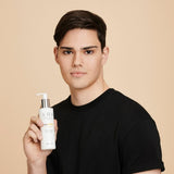 Young male model with clear, smooth complexion - showing the results ARK's skin clear cleanser can have